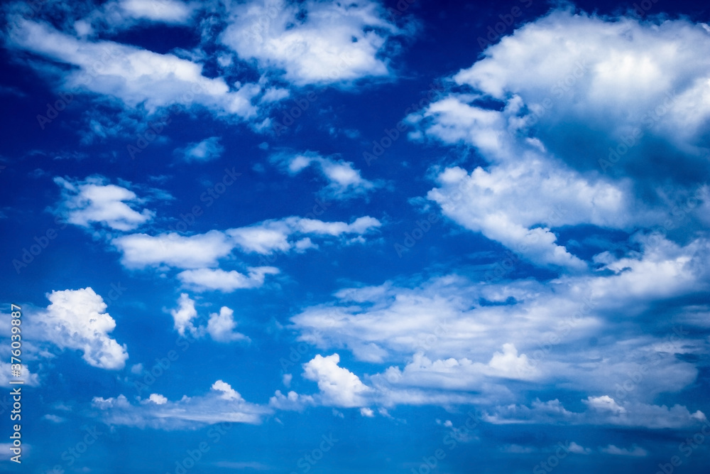 A blue sky white clouds on nature summer weather background A blue sky white clouds on nature summer weather background