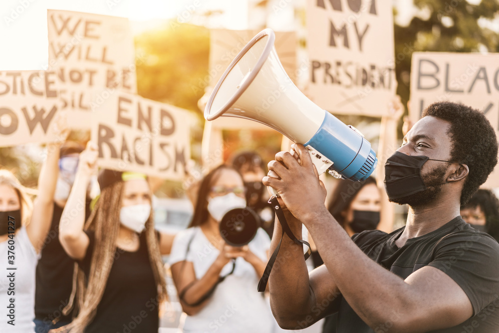 People from different culture and races protest on the street for equal ...