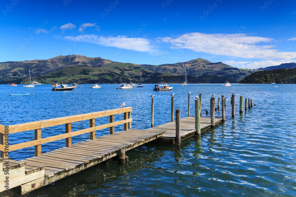 A multi-level wharf at Akaroa, New Zealand, allowing boats to dock easily at both high and low tide