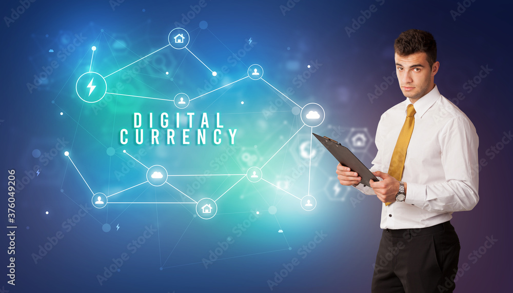 Businessman in front of cloud service icons with DIGITAL CURRENCY inscription, modern technology concept Businessman in front of cloud service icons with DIGITAL CURRENCY inscription, modern technology concept