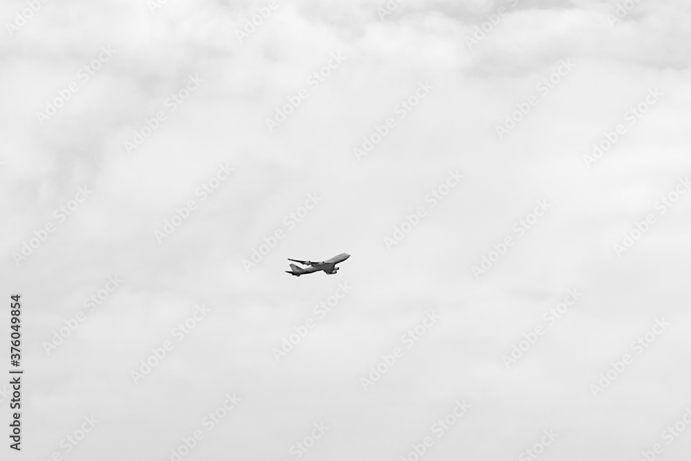 passenger plane in a cloudy sky passenger plane in a cloudy sky