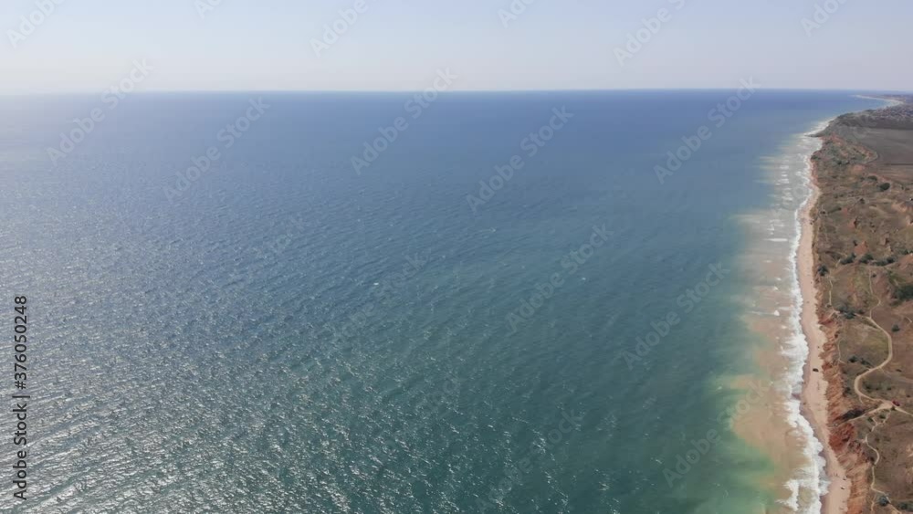 Ukrainian Black Sea shore near Odessa high aerial view of wild beaches far to the horizon. Travel and explore Ukraine now Ukrainian Black Sea shore near Odessa high aerial view of wild beaches far to the horizon. Travel and explore Ukraine now