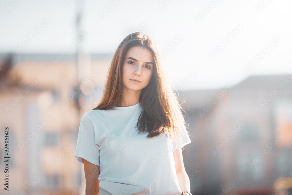 Summer sunny lifestyle fashion portrait. Young stylish hipster woman