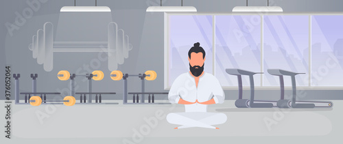 A man in a white kimono meditates. Kung Fu Master. The guy is doing yoga. Vector.