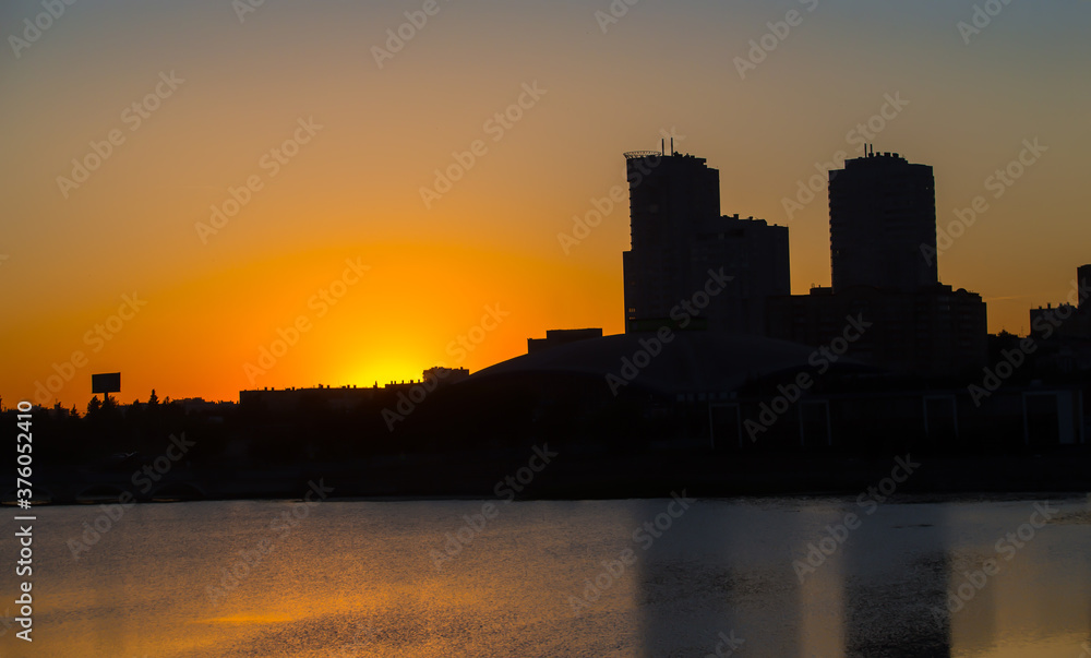 Beautiful cityscape at sunset in the evening. Beautiful cityscape at sunset in the evening.