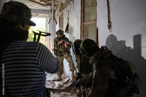A team of professional airsoft players clear the location from opponents