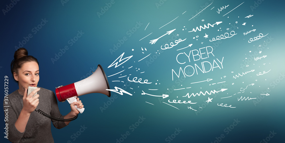 Young girl screaming to megaphone with CYBER MONDAY inscription, shopping concept Young girl screaming to megaphone with CYBER MONDAY inscription, shopping concept