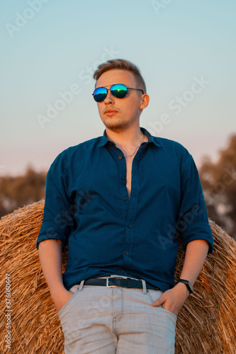 young man in sunglases photo