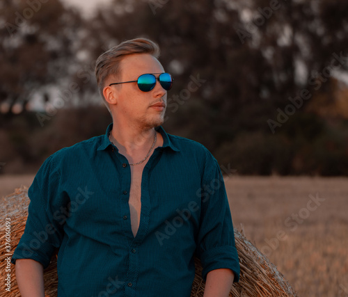 young man in sunglases
