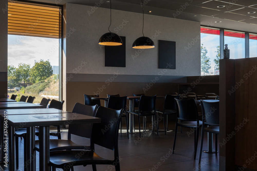 Fototapeta premium Modern simple cafe interior in contemporary style with minimalism furniture