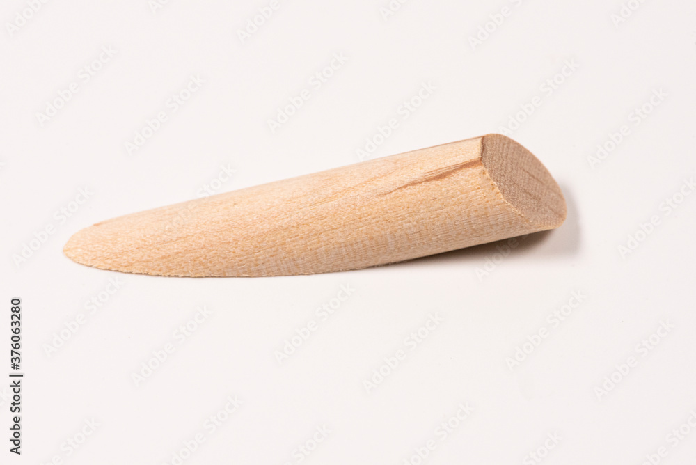 Close up heap of wooden dowel pins. Paint Grade Plugs Close up heap of wooden dowel pins. Paint Grade Plugs
