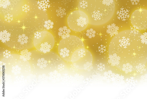 雪の結晶、金色に輝く冬のイメージ背景素材