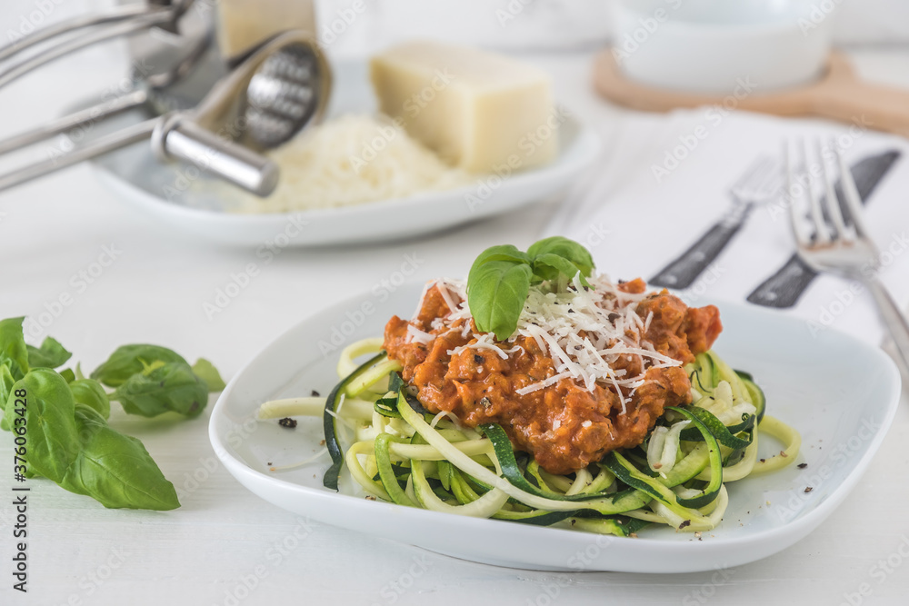 Zoodles bolognese: zucchini noodles with meat or vegan soy meat sauce and parmesan. For low carb, keto, paleo nutrition. Zoodles bolognese: zucchini noodles with meat or vegan soy meat sauce and parmesan. For low carb, keto, paleo nutrition.