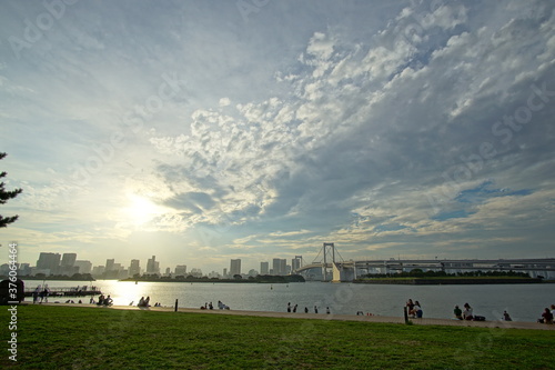 landscape of Odaiba rainbow bridge and cloudy sky, Tokyo, Japan 