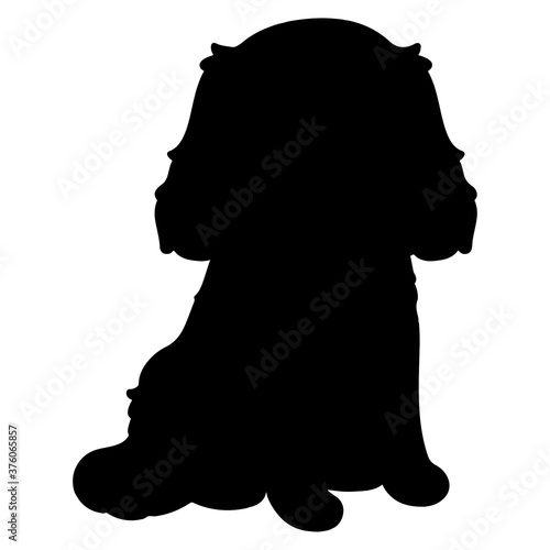 Silhouette of Cavalier King Charles Spaniel sitting