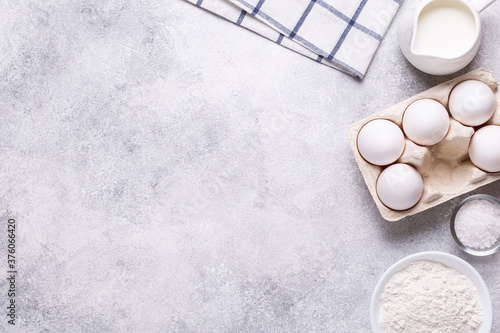 Ingredients for baking - flour, milk, salt, sugar, eggs.