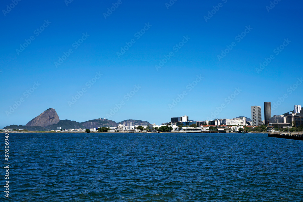 Fototapeta premium Cityscape of Rio with Sugar Loaf at the background
