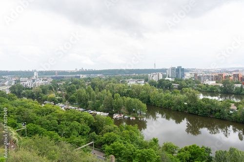  view of the flowing river Vltava and the surrounding nature in Prague