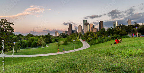 Low Angle View of Downtown Houstin From Large Park During Summer Sunset