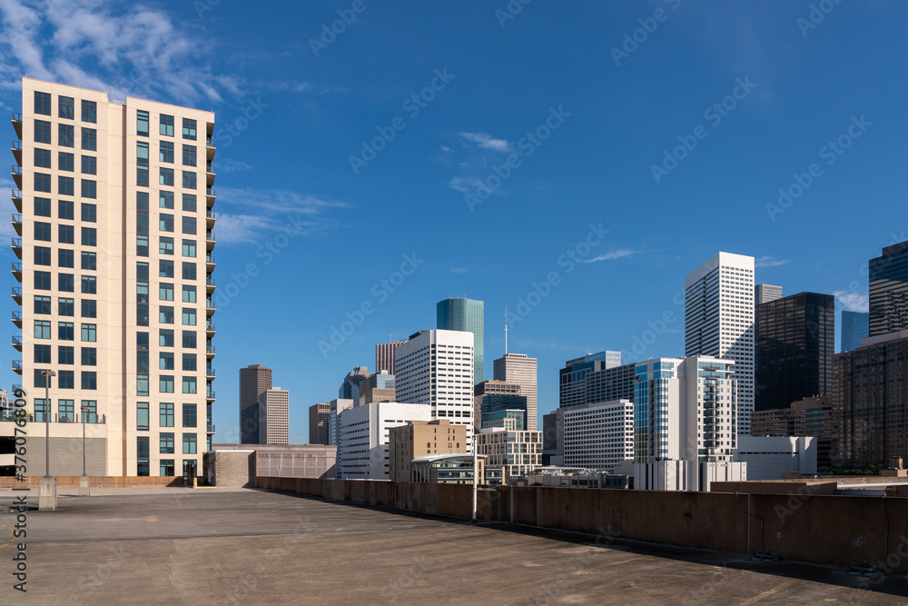 Early Morning View at the Houston Skyline from Empty Parking Lot Early Morning View at the Houston Skyline from Empty Parking Lot