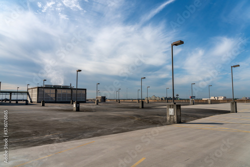 Large Roof Top Parking Lot with Mostly Clear Skies