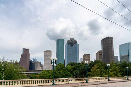 View of the Houston Skyline During the Day from Side Walk on Bridge © porqueno