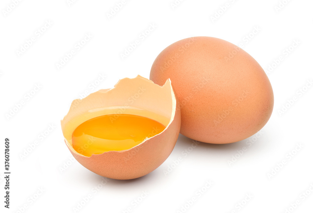 Chicken egg and half with yolk isolated on a white background. Chicken egg and half with yolk isolated on a white background.