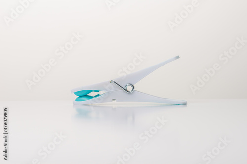 Colorful clothespin on a white background