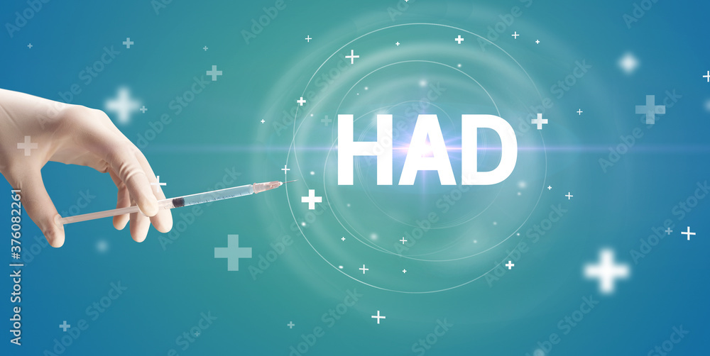 Syringe needle with virus vaccine and HAD abbreviation, antidote concept Syringe needle with virus vaccine and HAD abbreviation, antidote concept