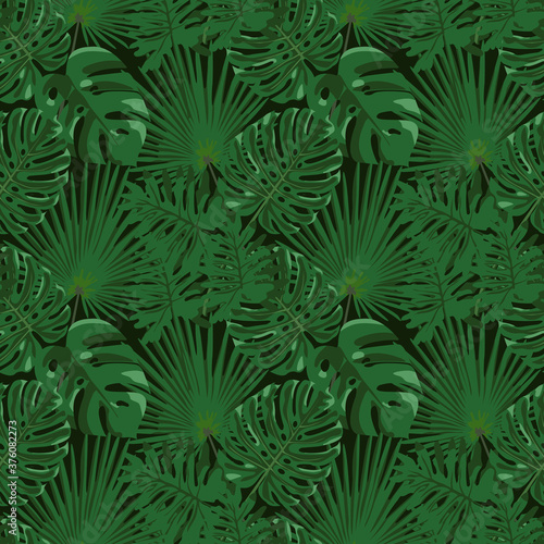 Tropical leaf design with a green palm and monstera plant leaves on a black background. Seamless vector repeating pattern. Design for printing fabric, clothes, bedding, wrapping paper, poster.