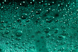 Abstract green bokeh texture on green background
