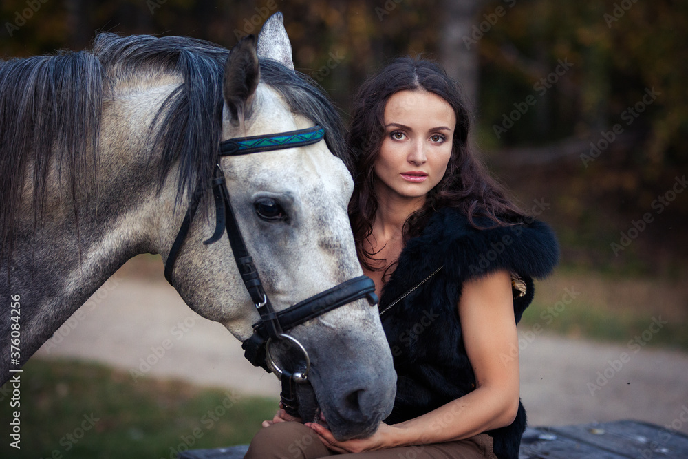 Obraz premium Girl and horse