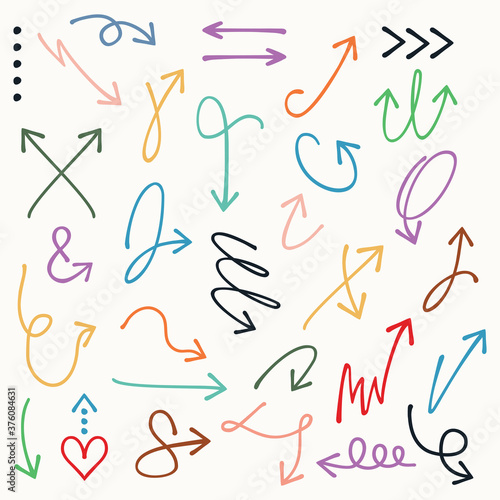 Colorful curvy and odd shape hand drawn direction arrows and pointers set on off white background