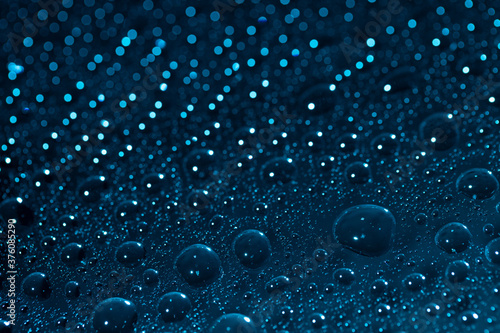 Blue Water drop Bokeh winter background