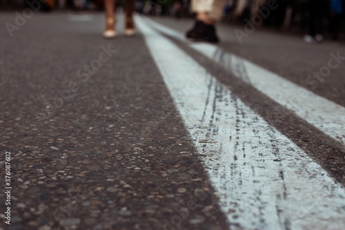 white markings on the asphalt