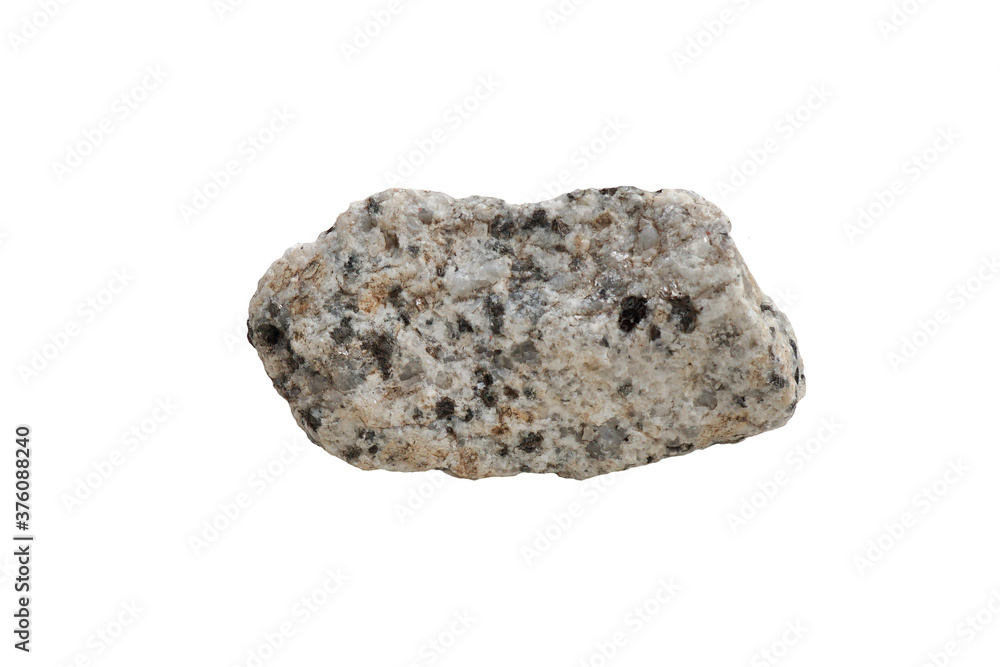 A piece of granite stone isolated on white background. A piece of granite stone isolated on white background.
