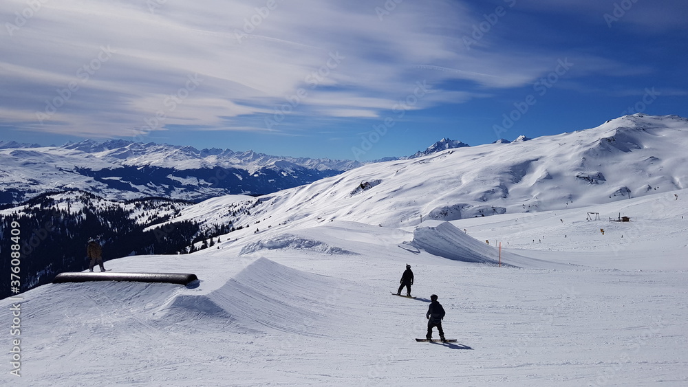 Skiing in the beautiful mountains of the Laax ski resort in Flims, Switzerland