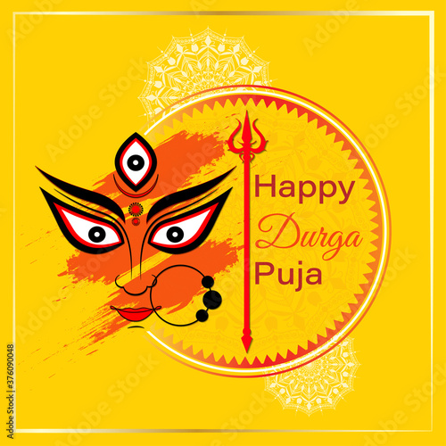Happy Durga Puja vector illustration background with goddess Durga eyes and trishul.