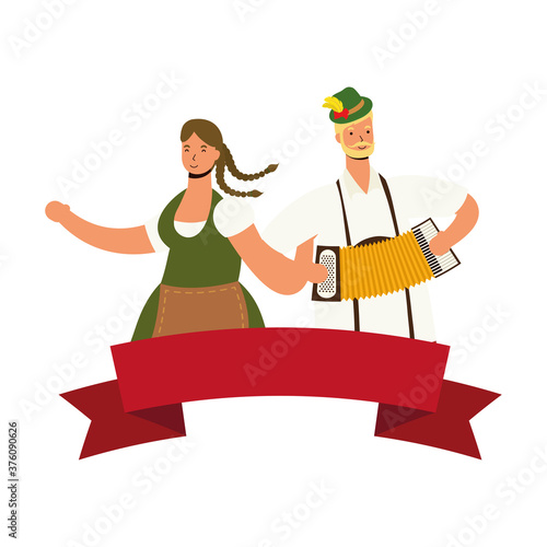 german couple wearing tyrolean suit drinking beers and playing accordion