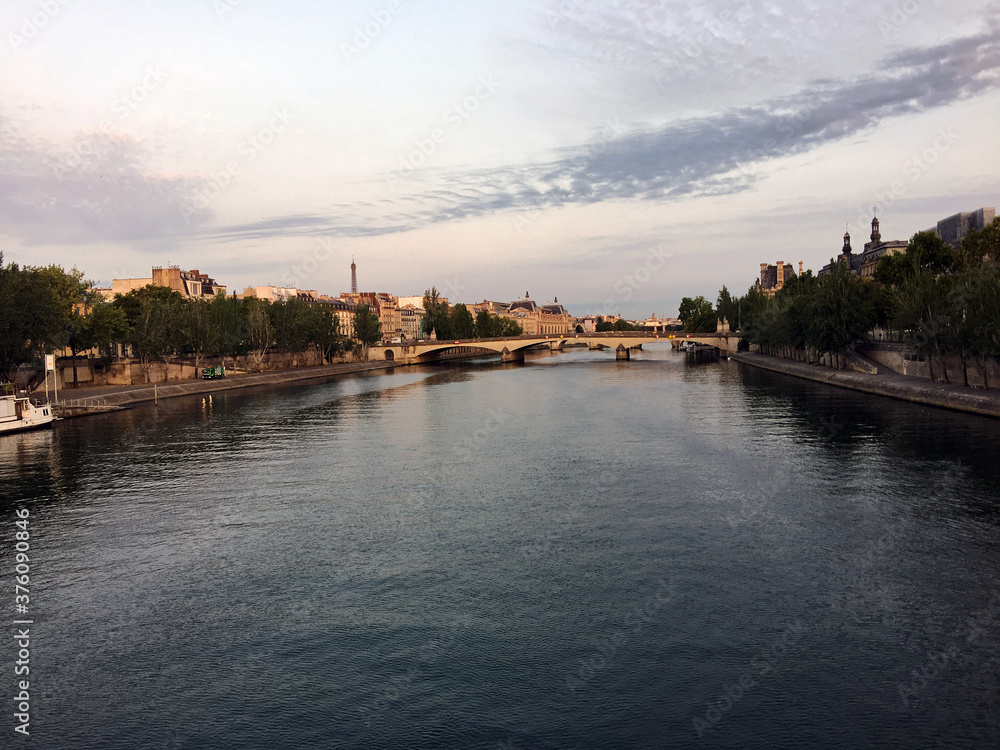 A view of the river Seine in Paris in the evening