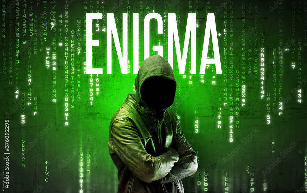 Faceless hacker with ENIGMA inscription, hacking concept Faceless hacker with ENIGMA inscription, hacking concept