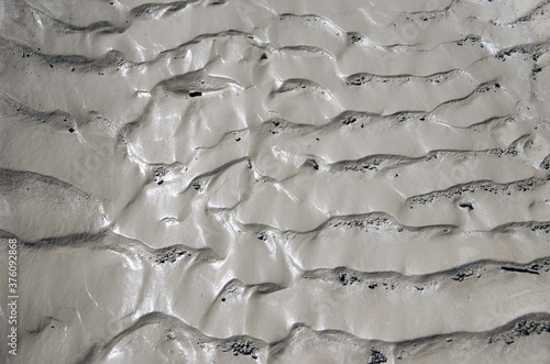 White sand texture. Sand mining background.
