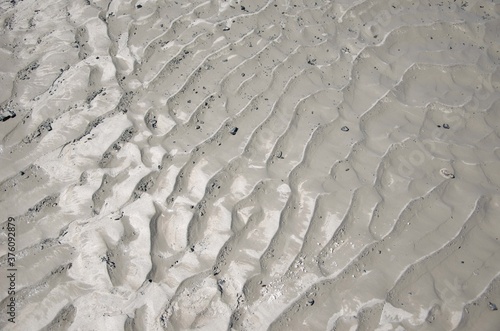 White sand texture. Sand mining background.