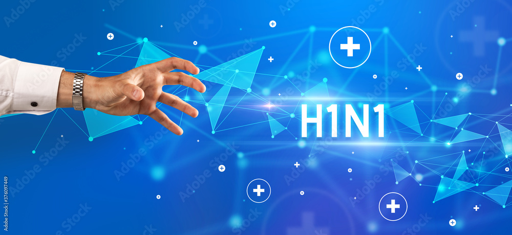 Close-Up of cropped hand pointing at H1N1 inscription, medical concept Close-Up of cropped hand pointing at H1N1 inscription, medical concept
