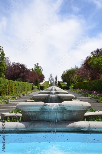 Beautiful water fountain cascading through a garden