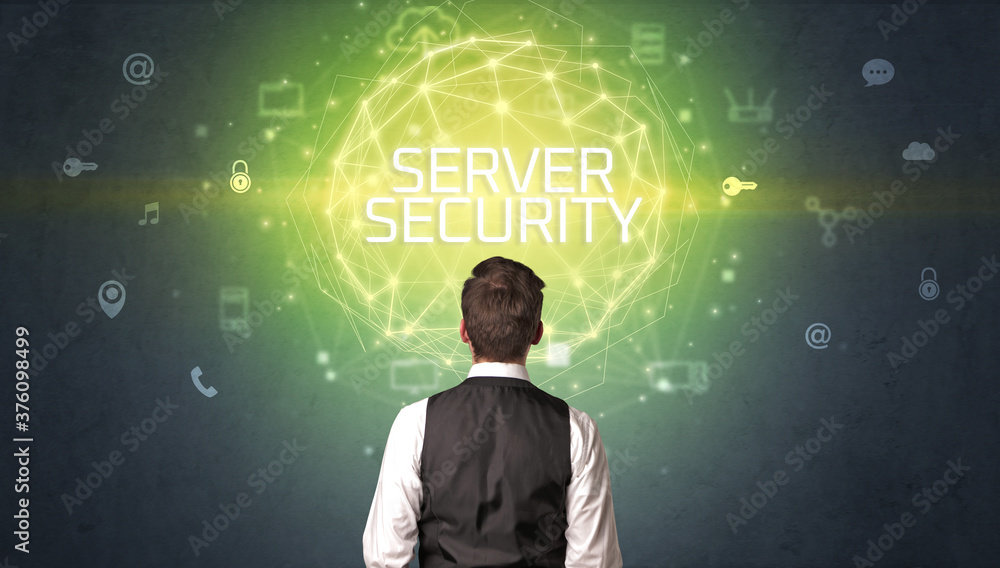 Rear view of a businessman with SERVER SECURITY inscription, online security concept Rear view of a businessman with SERVER SECURITY inscription, online security concept