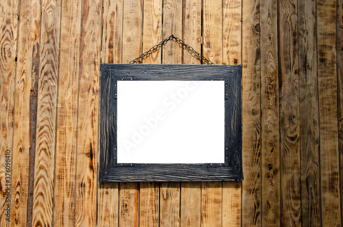 Brown wooden frame with white free lettering background.