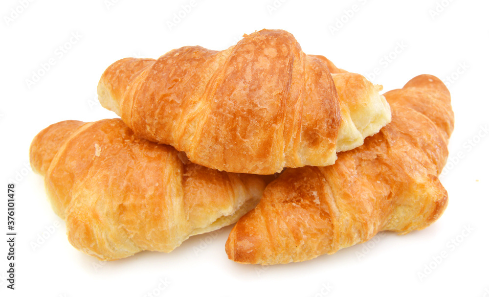 Fresh and tasty croissant over white background