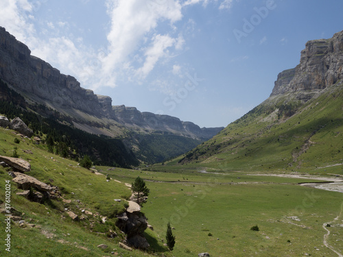 Ordesa Valley in the Pyrenees with mountains in the background.