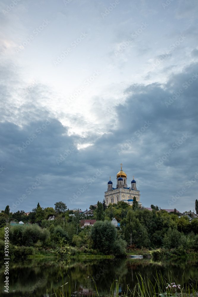 Russia, the city of Yelets, view of the Cathedral of the ascension of the Lord under a cloudy sunset sky. Russia, the city of Yelets, view of the Cathedral of the ascension of the Lord under a cloudy sunset sky.